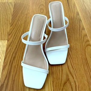 The Drop: white heeled sandals